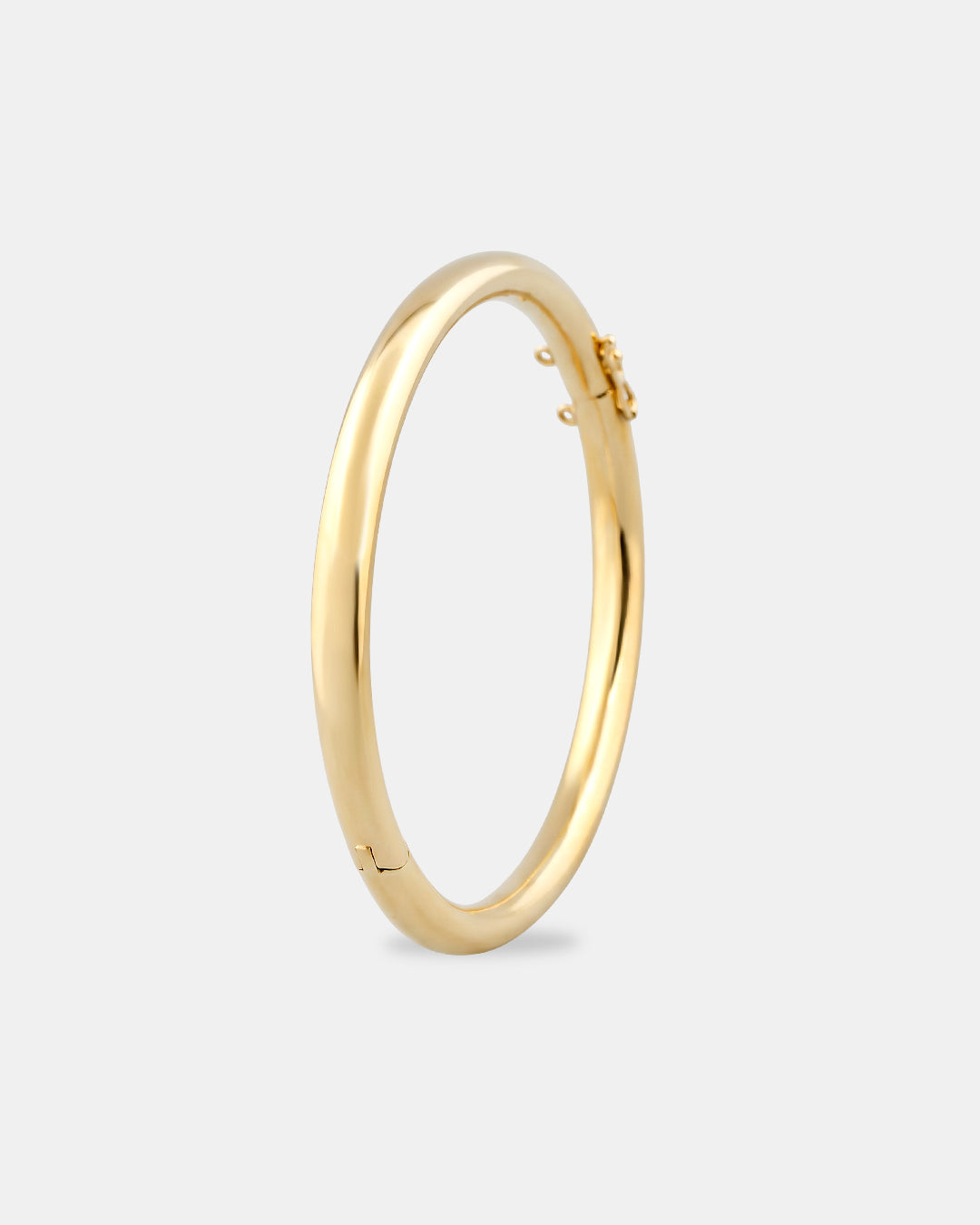 Pulsera de aro ovalado de oro